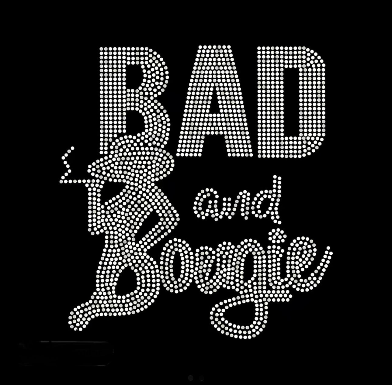 Decorative text 'BAD and Bowie' with rhinestone-like embellishments on a black background